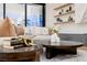 Comfortable living room featuring a neutral sectional sofa and stylish decor at 7682 Rafter Ct, Las Vegas, NV 89139