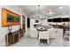 Open concept basement with living and entertainment areas featuring a bar, pool table, and modern decor at 8455 Stange Ave, Las Vegas, NV 89129