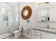 Modern bathroom featuring sleek marble countertop, glass shower with bench, and unique toilet combination at 8455 Stange Ave, Las Vegas, NV 89129