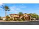 Beautiful two-story home with mature landscaping, palm trees, and a circular driveway at 8455 Stange Ave, Las Vegas, NV 89129