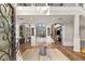 Elegant foyer with high ceilings, detailed millwork, and views into the living spaces at 8455 Stange Ave, Las Vegas, NV 89129