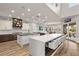 Spacious kitchen with marble countertops, a central island, and seating at 8455 Stange Ave, Las Vegas, NV 89129