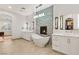 Modern main bathroom with dual sinks, a soaking tub, and a stylish design at 8455 Stange Ave, Las Vegas, NV 89129