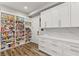 Well-organized pantry with ample shelving and cabinet space, ideal for storage and convenience at 8455 Stange Ave, Las Vegas, NV 89129