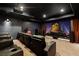 Home theater boasts reclining seating, a large projection screen, and a state-of-the-art sound system at 8455 Stange Ave, Las Vegas, NV 89129