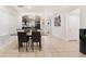 Dining room showcasing view into kitchen and open floor plan at 9132 Gabardine Ave, Las Vegas, NV 89149