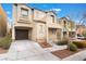 Attractive stucco home featuring an attached garage and private balcony for enjoying neighborhood views at 9132 Gabardine Ave, Las Vegas, NV 89149