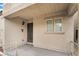 Charming covered front porch with stucco walls, offering a welcoming entrance to the residence at 9132 Gabardine Ave, Las Vegas, NV 89149