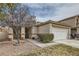 Charming single-story home featuring a two-car garage and desert landscaping in a well-kept neighborhood at 9844 Altadena St, Las Vegas, NV 89183