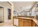Granite counters accent this kitchen with views to living areas at 9844 Altadena St, Las Vegas, NV 89183