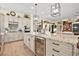 Spacious kitchen with a large island, stainless steel appliances, and custom cabinetry at 10404 Longwood Dr, Las Vegas, NV 89134