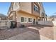 Backyard featuring gravel, patio pavers, a fence, and access to the house at 1142 Heavenly Harvest Pl # 2, Henderson, NV 89002