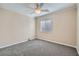 Bedroom with neutral walls, carpet, and a window for natural light at 1142 Heavenly Harvest Pl # 2, Henderson, NV 89002