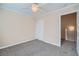 Bedroom with neutral walls, carpet, closet with sliding doors, and ceiling fan at 1142 Heavenly Harvest Pl # 2, Henderson, NV 89002