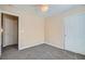 Bedroom with neutral walls, carpet, closet with sliding doors, and a ceiling fan at 1142 Heavenly Harvest Pl # 2, Henderson, NV 89002