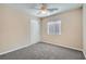 Bedroom with neutral walls, carpet and closet with sliding doors, plus a ceiling fan at 1142 Heavenly Harvest Pl # 2, Henderson, NV 89002