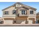 Inviting townhome featuring a private balcony and three-car garage, perfect for comfortable living at 1142 Heavenly Harvest Pl # 2, Henderson, NV 89002
