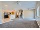 Open concept living space with stairs, seamlessly connecting the living room and kitchen at 1142 Heavenly Harvest Pl # 2, Henderson, NV 89002