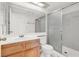 Bright bathroom featuring a wooden vanity, large mirror and shower at 1701 E Katie Ave # 21, Las Vegas, NV 89119