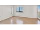 Inviting bedroom featuring hard wood floors, windows, and plenty of natural light at 1701 E Katie Ave # 21, Las Vegas, NV 89119