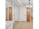 Open living space showing access to kitchen with oak cabinetry and white appliances at 1701 E Katie Ave # 21, Las Vegas, NV 89119