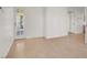 Spacious living room with wood floors and a glass door that looks out to the back yard at 1701 E Katie Ave # 21, Las Vegas, NV 89119