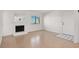 Bright living room featuring a fireplace, large window, and a neutral color scheme at 1701 E Katie Ave # 21, Las Vegas, NV 89119