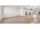 Open living room with tile entrance and view of kitchen with white appliances at 1701 E Katie Ave # 21, Las Vegas, NV 89119
