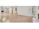 Spacious living room with mirrored wall and fireplace, adjacent to the kitchen area at 1701 E Katie Ave # 21, Las Vegas, NV 89119