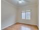 Bedroom with hardwood floors, one window and neutral paint providing a calming, comfortable feel at 1808 Eagle Village Ave, Henderson, NV 89012