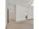 This bedroom features neutral carpet, a ceiling fan, and an ensuite bathroom at 2084 Fort Halifax St, Henderson, NV 89052