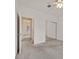 This bedroom features neutral carpet, a ceiling fan, and a mirrored closet at 2084 Fort Halifax St, Henderson, NV 89052