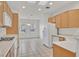 Kitchen featuring ample cabinet space, tile floors, and modern appliances at 2084 Fort Halifax St, Henderson, NV 89052