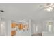 Open living room with a view of the kitchen and a ceiling fan at 2084 Fort Halifax St, Henderson, NV 89052