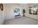 Bedroom with a window, carpet, and accent wall art at 2156 Twin Falls Dr, Henderson, NV 89044
