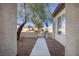 Gated entry to the courtyard, with a view of neighborhood homes at 2156 Twin Falls Dr, Henderson, NV 89044
