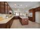 Bright kitchen with an island, extensive countertops, and stainless steel appliances, ready for any culinary adventure at 2156 Twin Falls Dr, Henderson, NV 89044