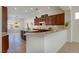 Spacious kitchen featuring an island, stainless steel appliances, and warm wood cabinets, perfect for cooking at 2156 Twin Falls Dr, Henderson, NV 89044