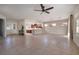 Expansive living room with tile flooring, view of the kitchen, and natural light at 2156 Twin Falls Dr, Henderson, NV 89044