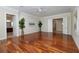 Expansive main bedroom featuring hardwood floors, ample natural light, and multiple entryways at 2156 Twin Falls Dr, Henderson, NV 89044