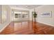 Serene main bedroom with lustrous hardwood floors, enhanced by natural light at 2156 Twin Falls Dr, Henderson, NV 89044