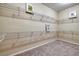 A walk-in closet with wire shelving and neutral carpet at 2156 Twin Falls Dr, Henderson, NV 89044