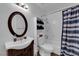 Well-maintained bathroom featuring a shower/tub combo, vanity with sink, and modern fixtures at 2302 Wagonwheel Ave, Las Vegas, NV 89119
