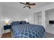 Cozy bedroom with hardwood floors and a comfortable bed, offering a peaceful and inviting atmosphere at 2302 Wagonwheel Ave, Las Vegas, NV 89119