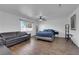 Spacious bedroom with hardwood floors, a ceiling fan, and a modern aesthetic at 2302 Wagonwheel Ave, Las Vegas, NV 89119