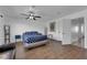 Large bedroom featuring a comfortable bed, modern decor, and ample natural light at 2302 Wagonwheel Ave, Las Vegas, NV 89119