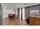 Bright dining area featuring wood floors, a dining table set, and ample natural light at 2302 Wagonwheel Ave, Las Vegas, NV 89119