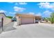 Charming single-story home with a two car garage and a large driveway at 2302 Wagonwheel Ave, Las Vegas, NV 89119