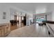Open-concept living room with tile flooring, comfortable seating, and pool views at 2302 Wagonwheel Ave, Las Vegas, NV 89119