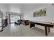 Bright living room with tile floors, comfortable seating, and plenty of natural light at 2302 Wagonwheel Ave, Las Vegas, NV 89119